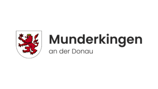 Logo der Stadt Munderkingen in Schwarz mit einem Wappen.